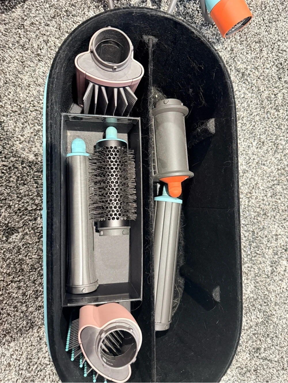 Dyson multi-attachment styler in aqua, coral and rose gold
